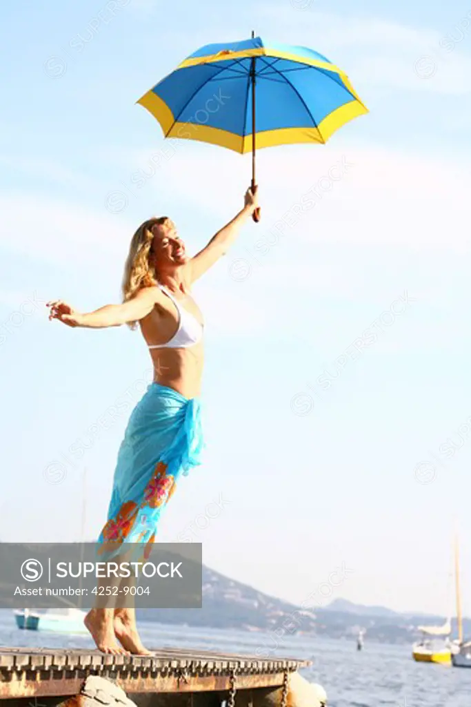 Woman beach umbrella