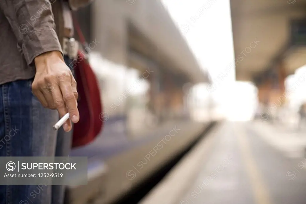 Woman train station tobacco