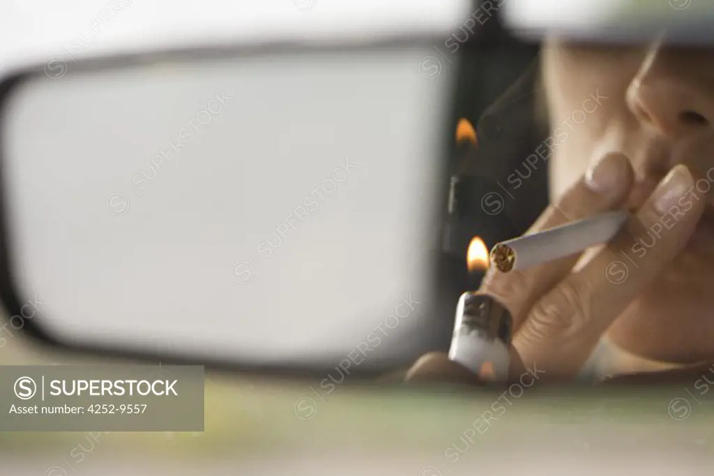 Woman car cigaret