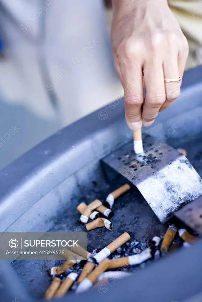 Woman put out cigaret