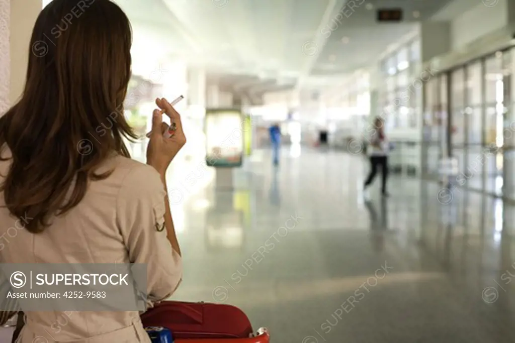 Woman airport tobacco