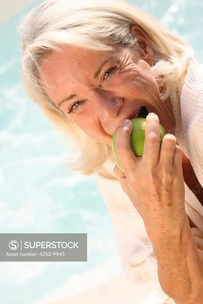 Senior woman apple