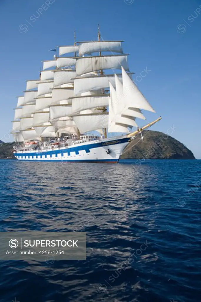 Sailing cruise ship Royal Clipper (Star Clippers Cruises) under full sail,Mediterranean Sea, near Lipari, Aeolian Islands, near Sicily, Italy, Europe
