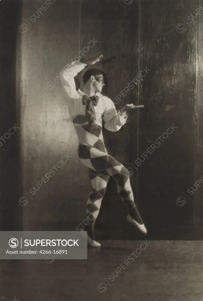 Vaslav Nijinsky as Harlequin in the Ballet Le Carnaval by Robert Schumann by Anonymous  /Private Collection/1910/Photograph/Opera, Ballet, Theatre