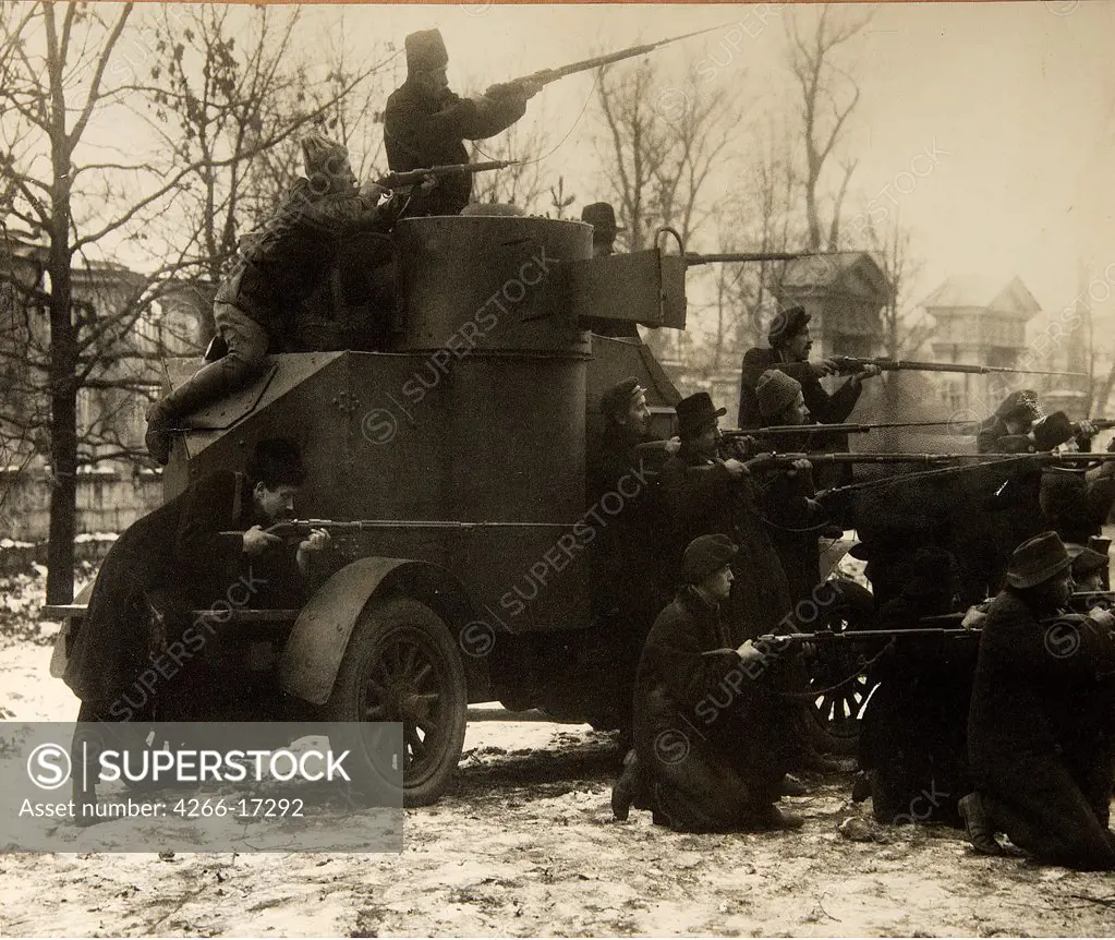 October Revolution. Red Guard Soldiers near Captured Armoured Car. 25 October, 1917. Petrograd by Otsup, Pyotr Adolfovich (1883-1963)/Russian State Film and Photo Archive, Krasnogorsk/1917/Photograph/Russia/History