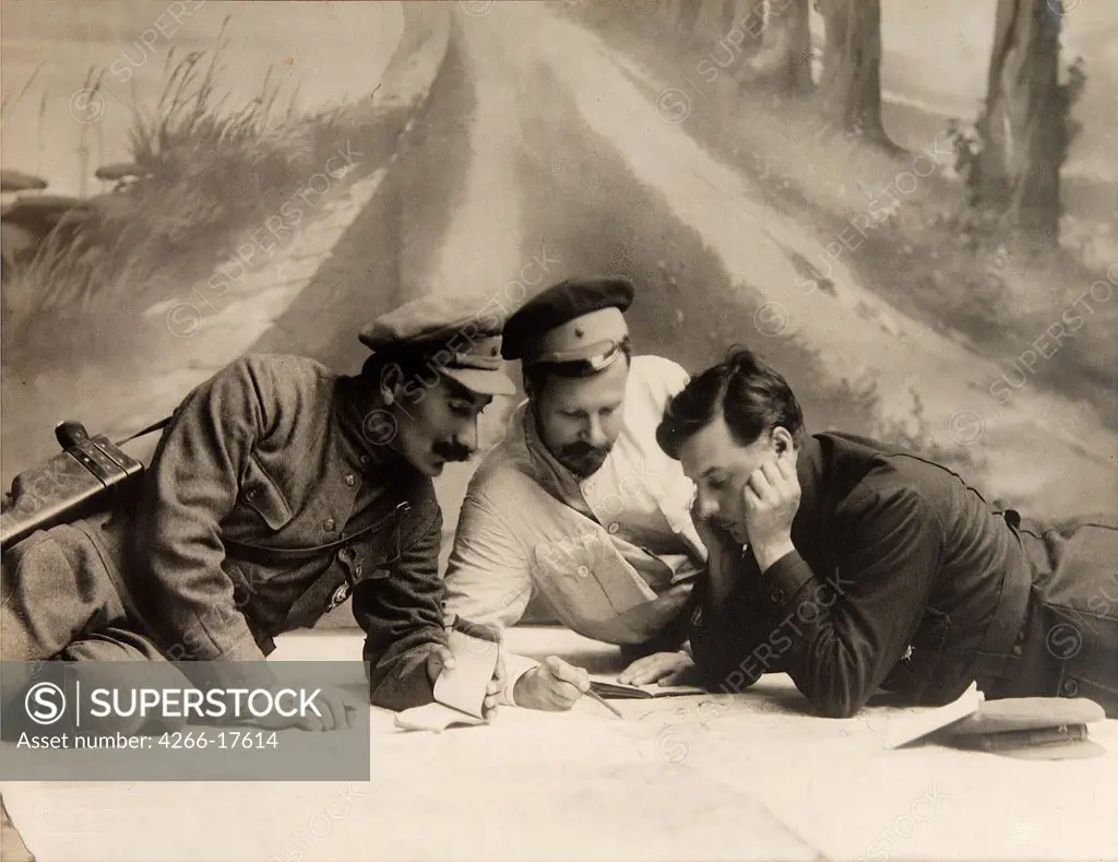 Civil War. Commandants Semyon Budyonny, Michail Frunze and Kliment Voroshilov Reading the Map by Otsup, Pyotr Adolfovich (1883-1963)/Russian State Film and Photo Archive, Krasnogorsk/1920/Photograph/Russia/Portrait