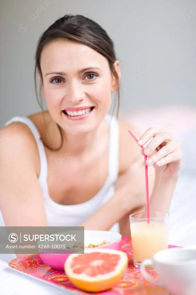 Woman having breakfast.