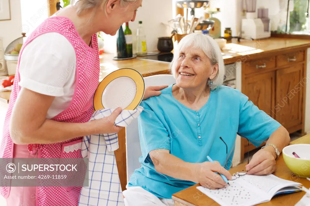 80 years old woman with a home care attendant.