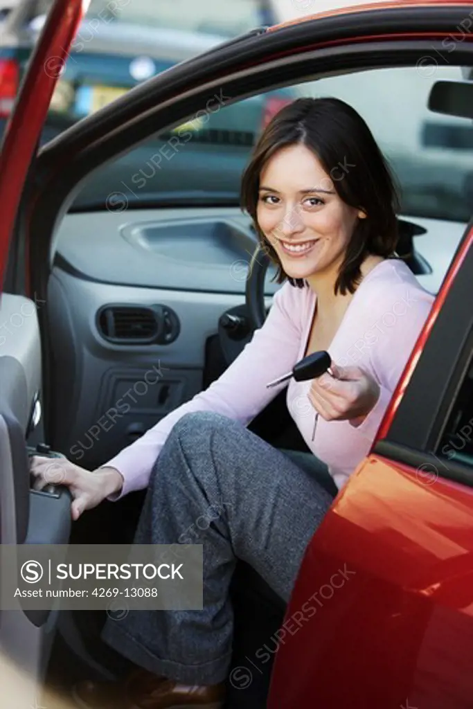 Woman sitting in car.