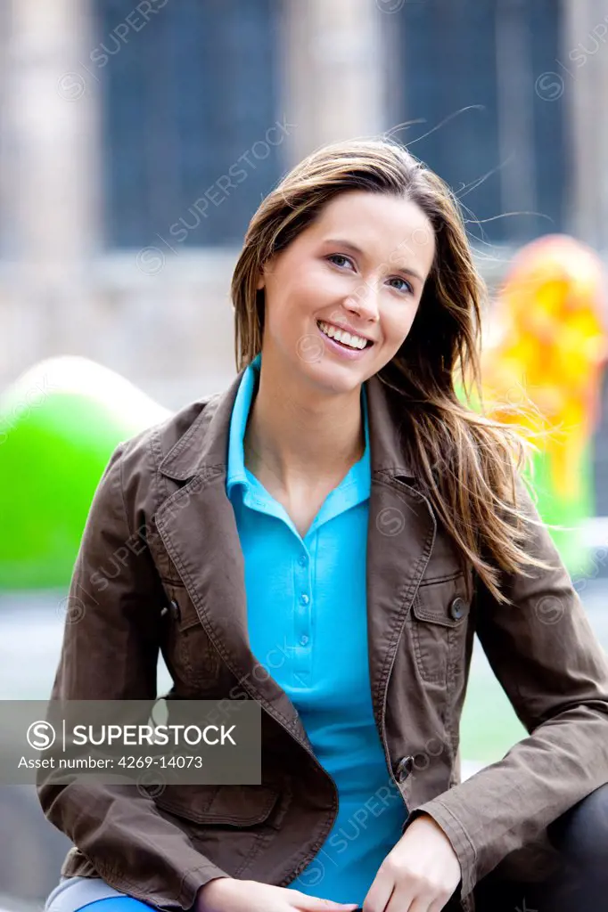 Portrait of a woman smiling.