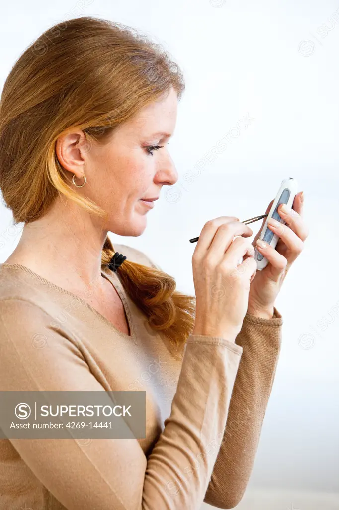 Woman using a smartphone.