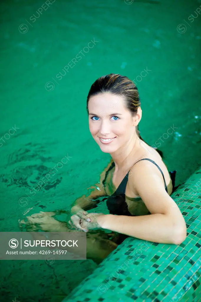Woman in swimming pool.