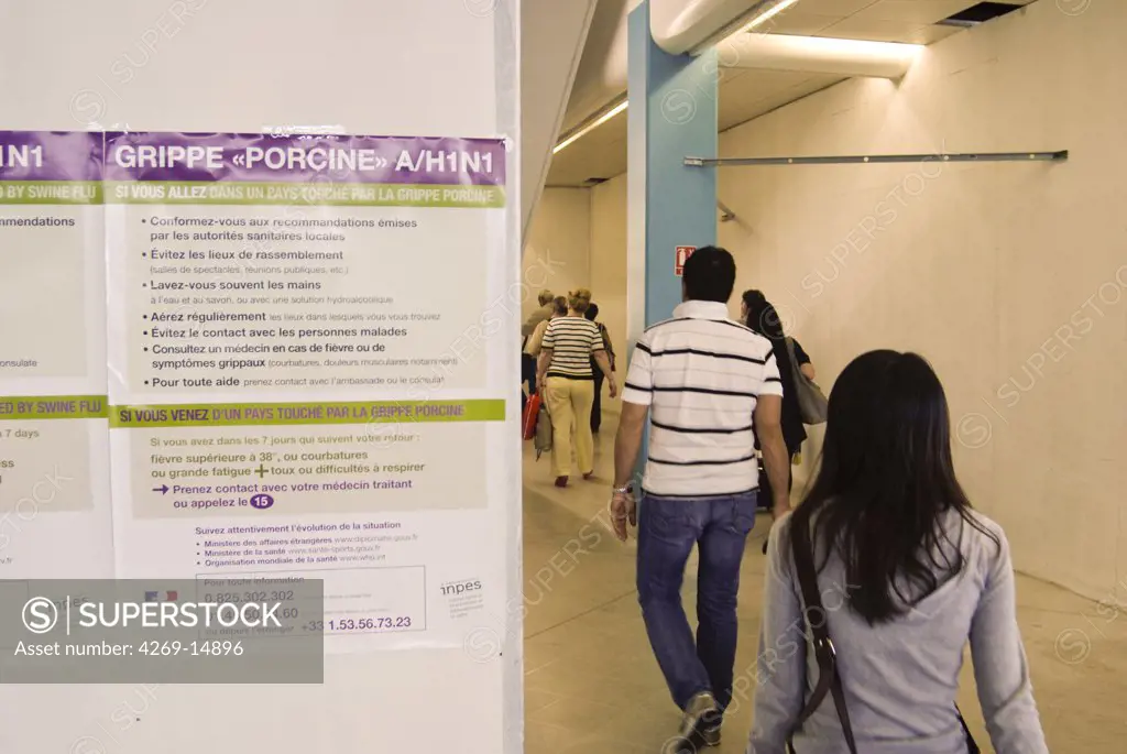 Information posters on A/H1N1 influenza for passengers arriving to Roissy-Charles de Gaulle airport, Paris, France.