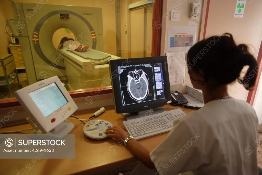 Patient undergoing a Computed Tomography (CT) scan of the brain.
