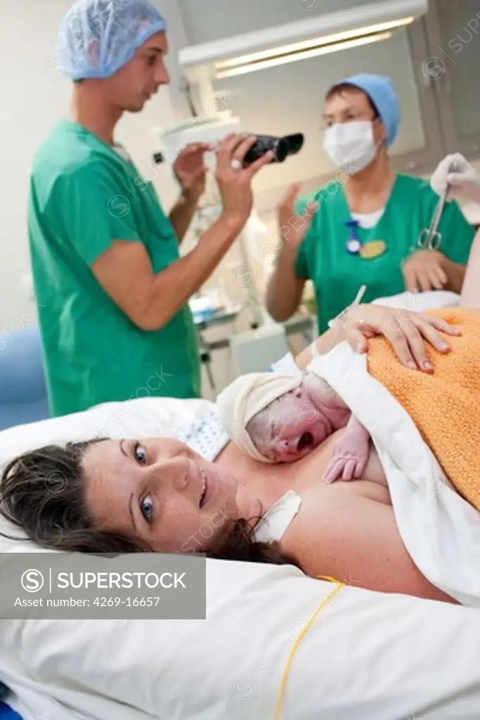 Woman in labor room during delivery. Obstetrics and gynaecology department, Saintonges hospital, Saintes, France.
