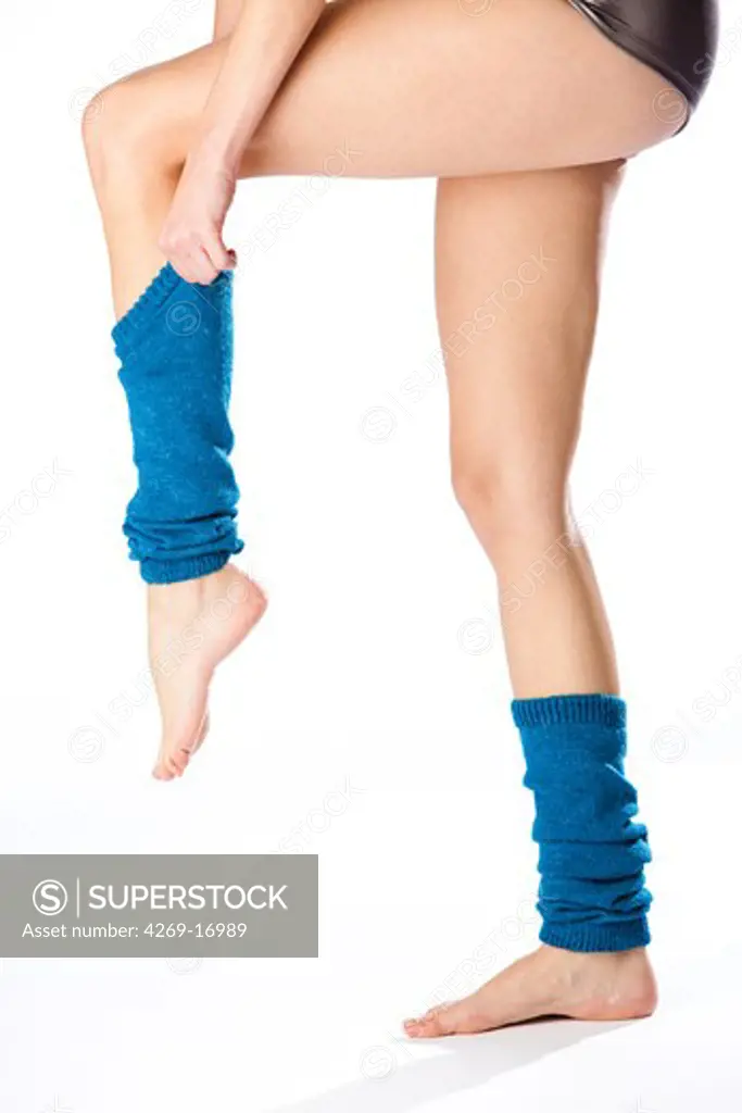 Woman carrying gaiters.
