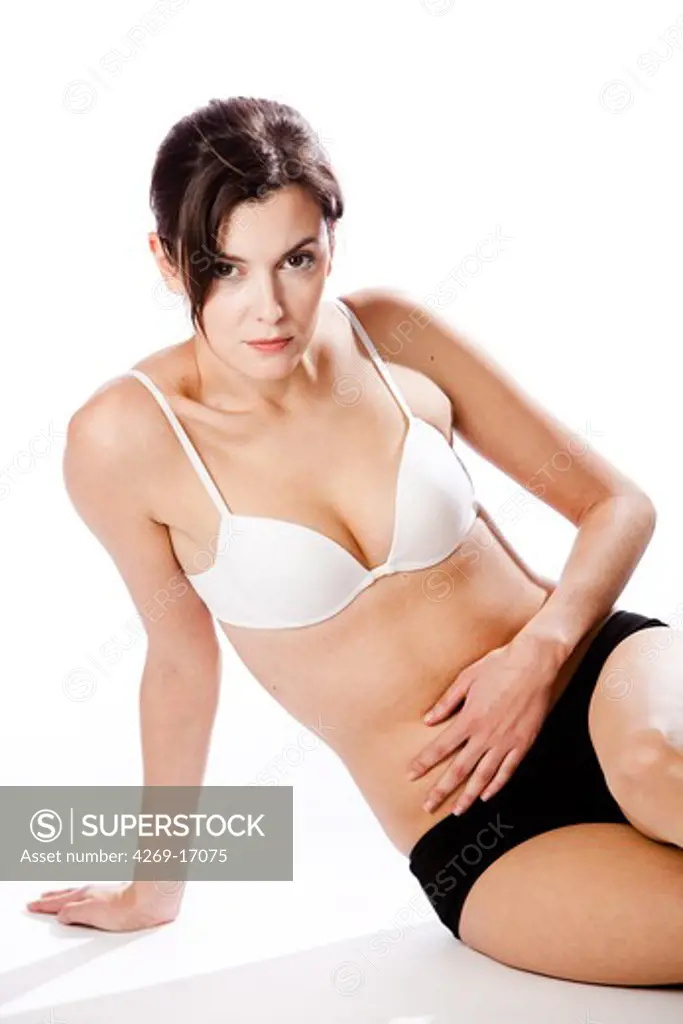 Woman suffering from abdominal pain.