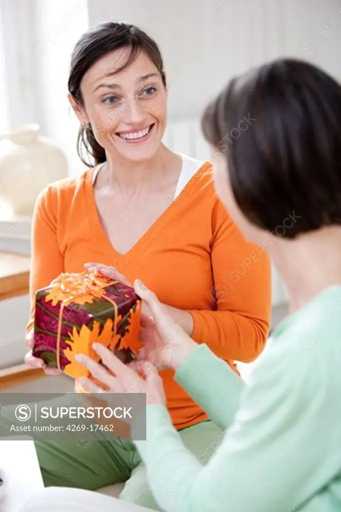 Woman receiving a gift.