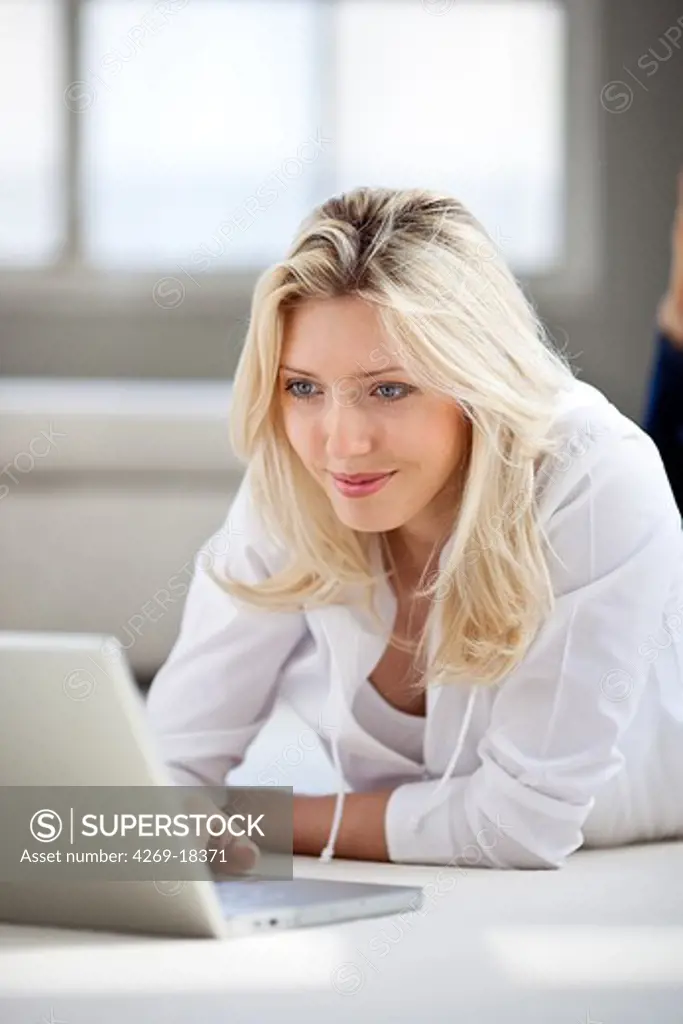 Woman using a laptop computer.