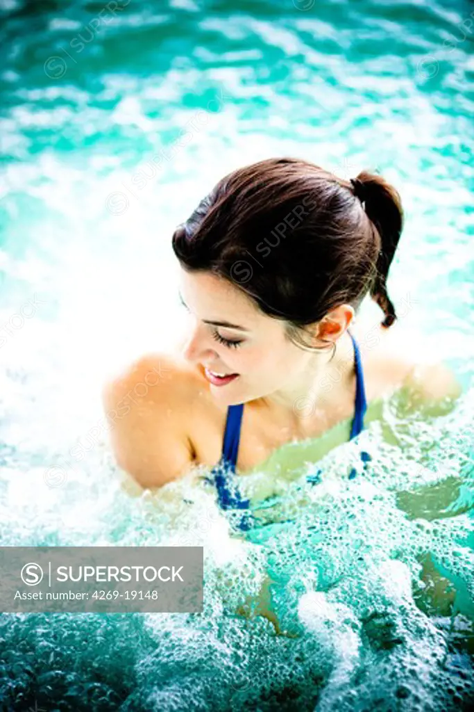 Woman in spa pool.