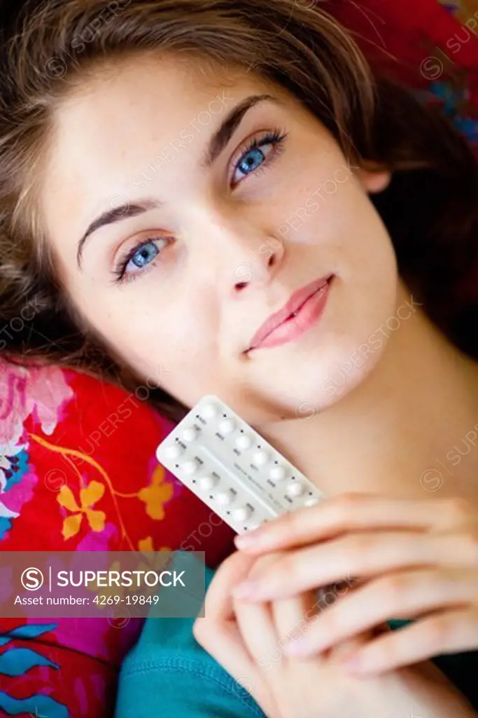 Woman with generic contraceptive pills.