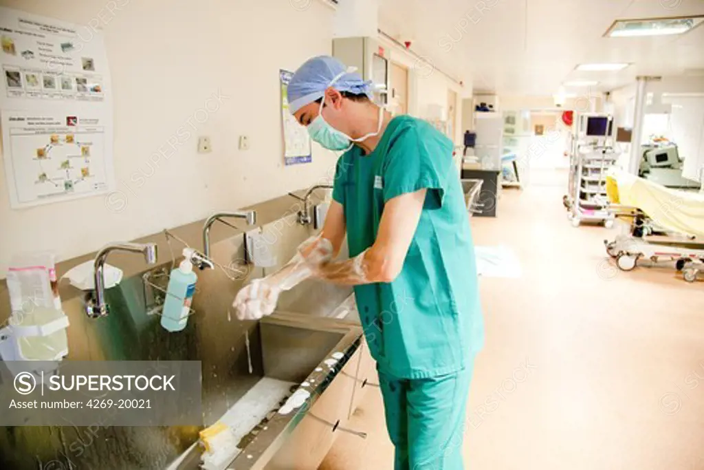 Surgeon washing hands. St Antoine hospital, Paris.