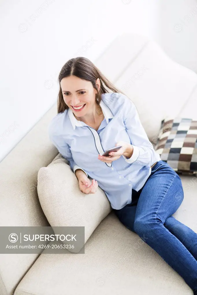 Woman using an Iphone®.