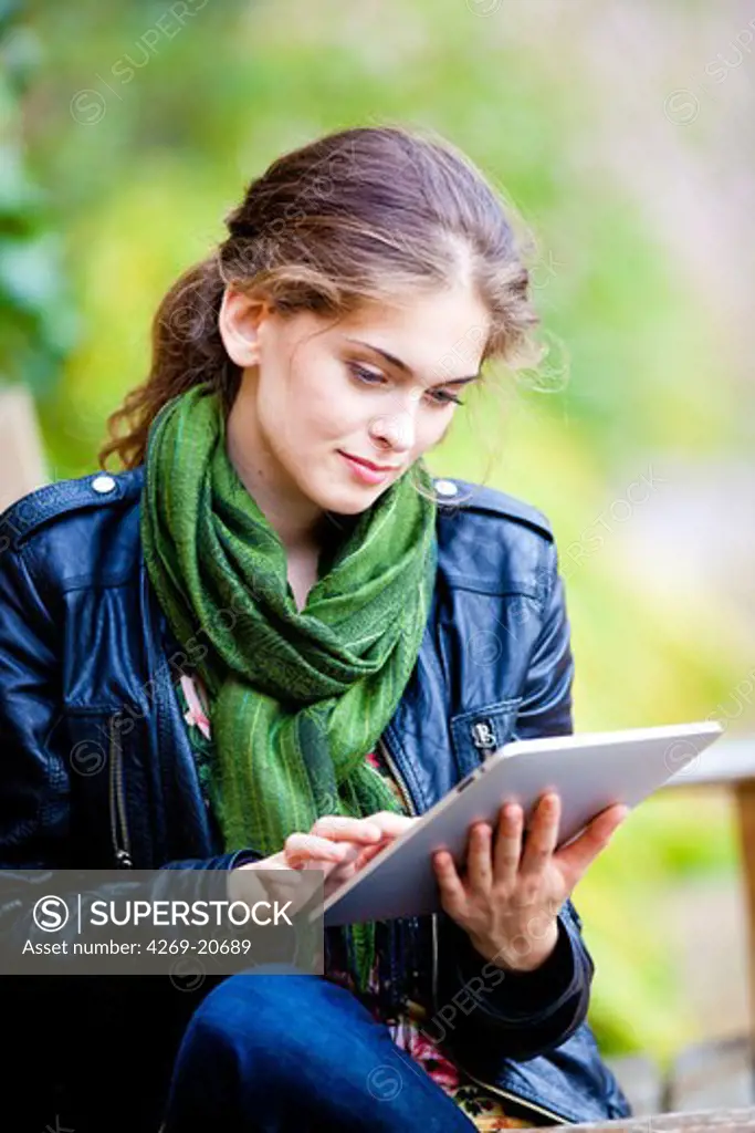 Woman using iPad®.