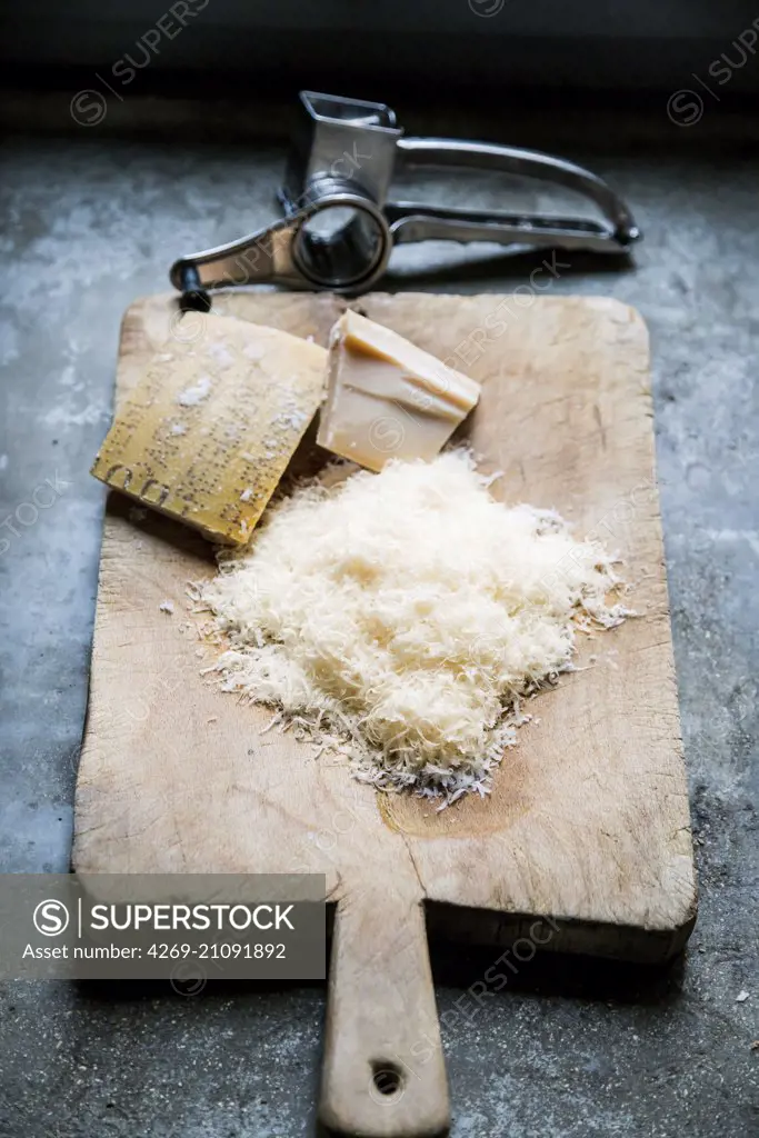 Parmesan cheese and grater.