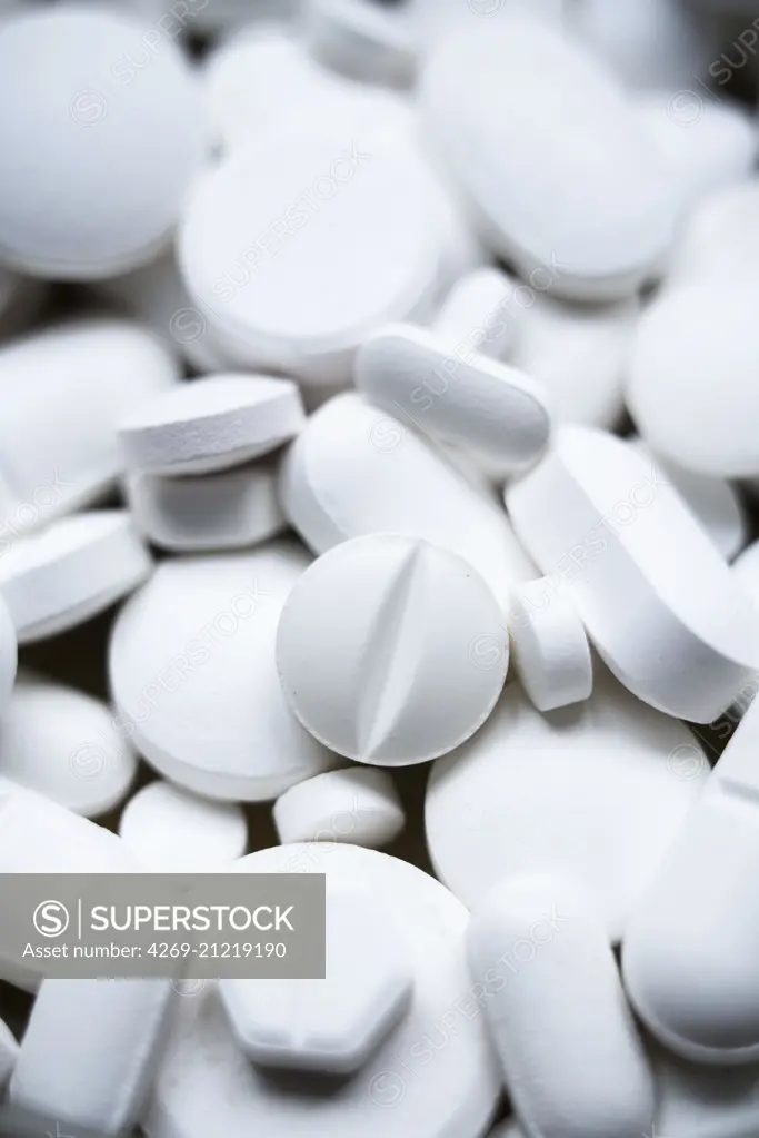 White pills.