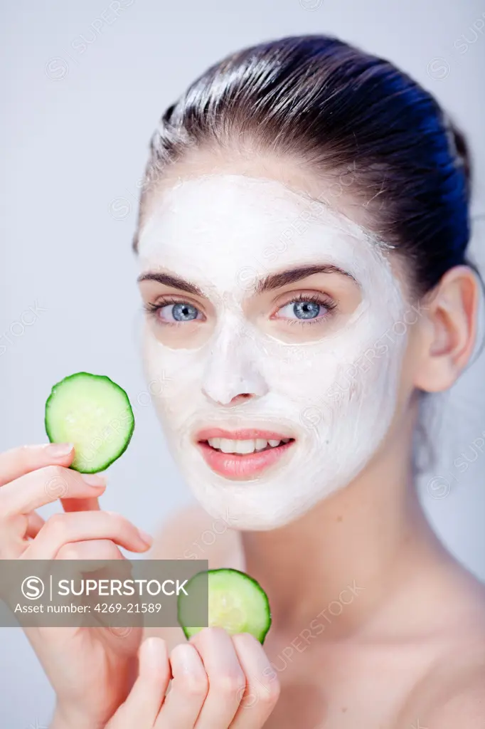 Woman with cosmetic beauty mask.