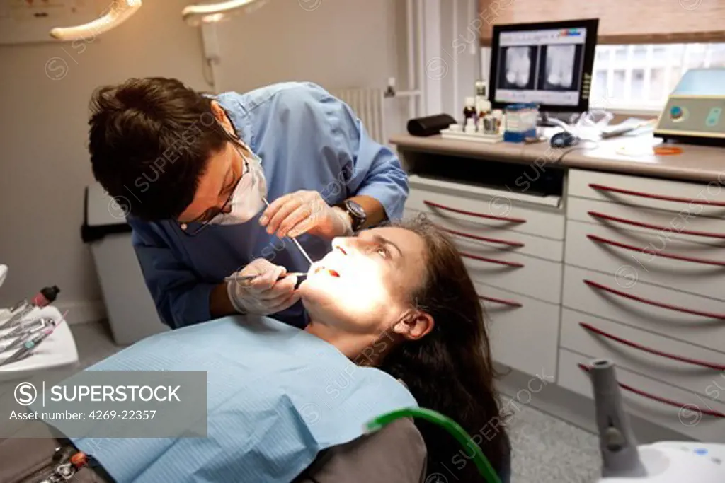 Woman undergoing a dental examination.