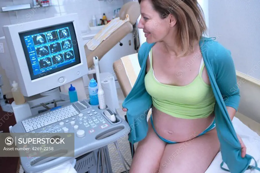 9 months pregnant woman undergoing an obstetrical ultrasound scan.