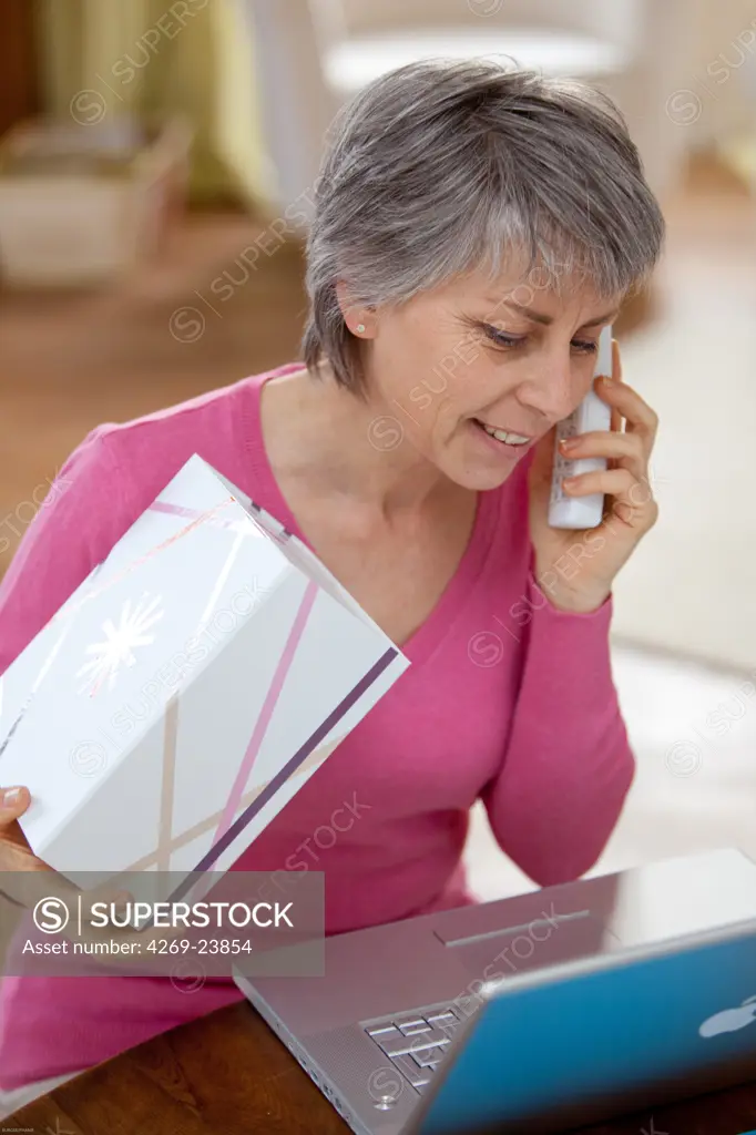 Woman receiving mail package.