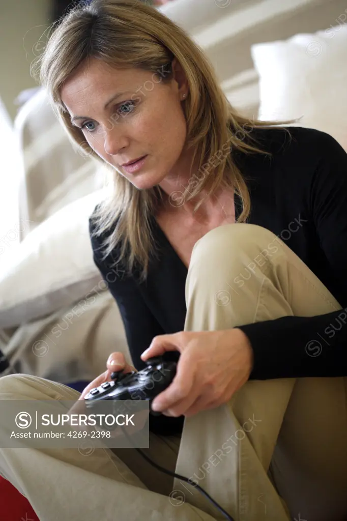 Woman playing video game.