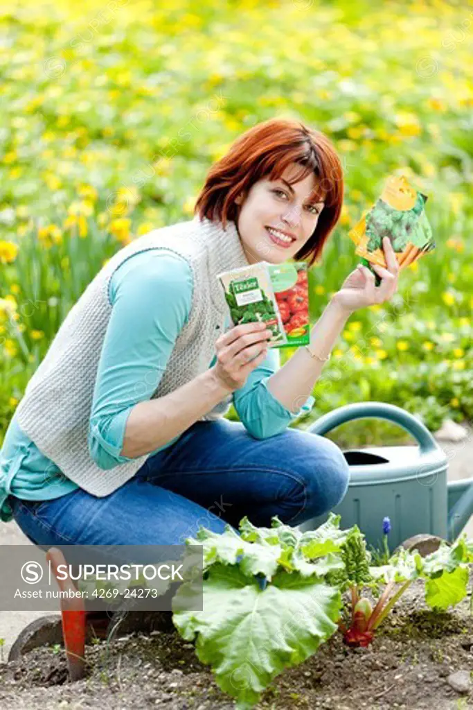 Woman gardening in her vegetable garden.