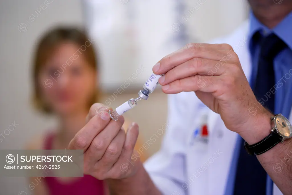 Woman receiving vaccination at the yellow fever vaccination center of the Cochin Saint-Vincent-de-Paul hospital, Paris, France.