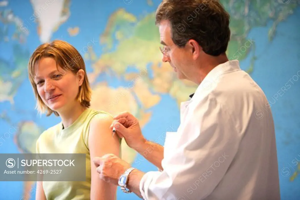 Woman receiving vaccination at the yellow fever vaccination center of the Cochin Saint-Vincent-de-Paul hospital, Paris, France.