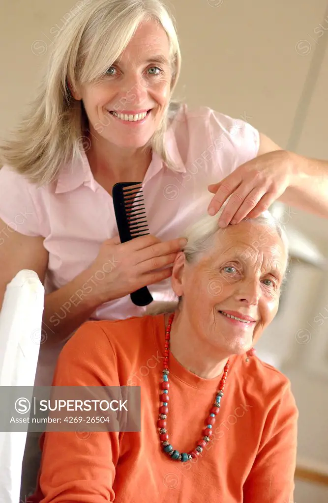 Elderly person. Mother and daughter