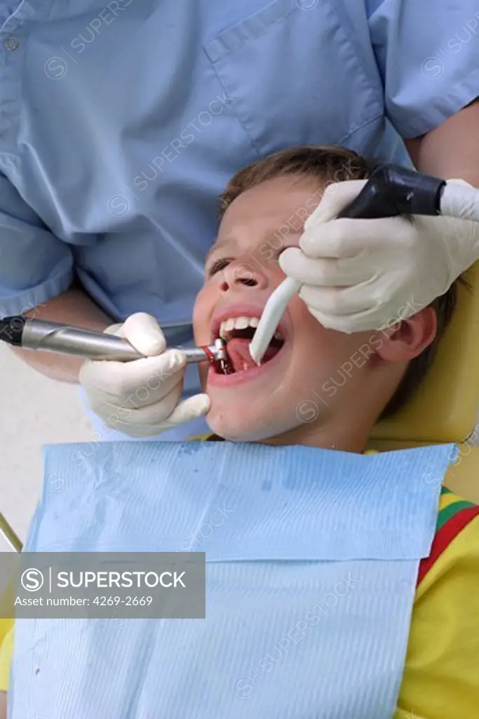8 years old child at the dentist.