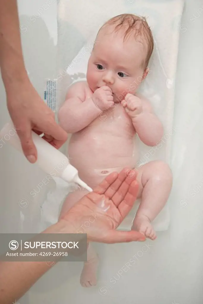 Baby. 2 months old baby havaing a bath.