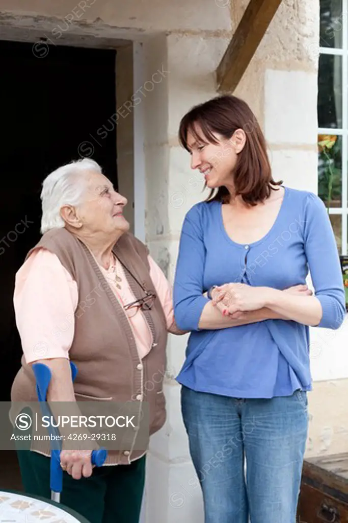 Woman talking to a 94 years old woman.