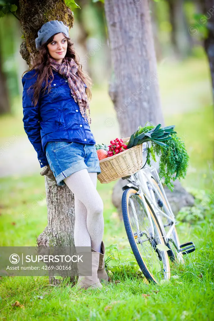 Woman riding her bike.