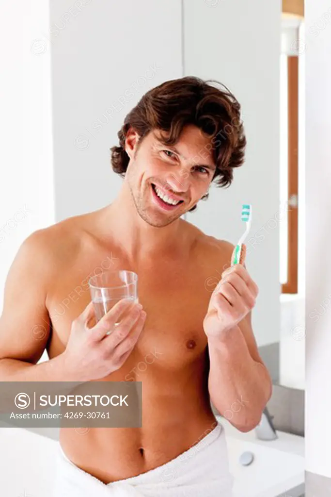 Man. Man brushing her teeth.