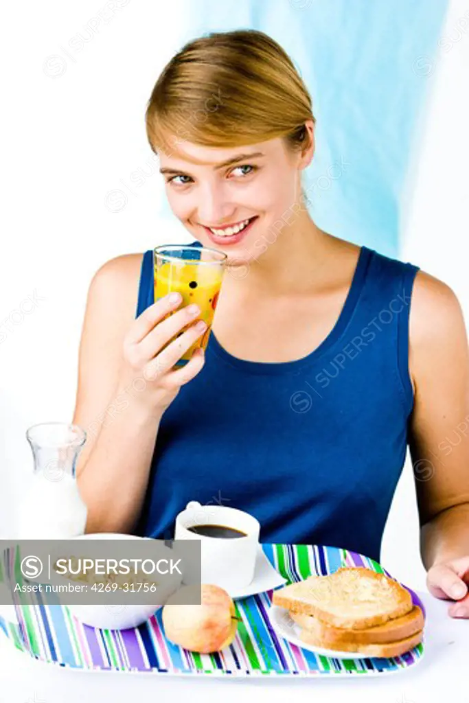 woman having breakfast.