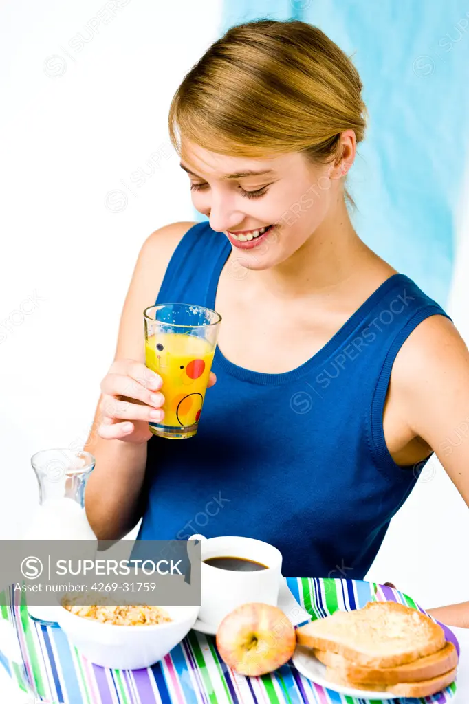woman having breakfast.
