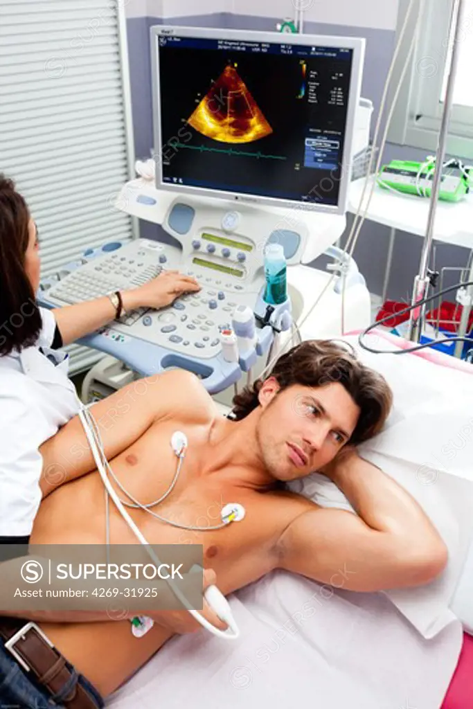 Patient undergoing a heart ultrasound scan. Limoges hospital, France.