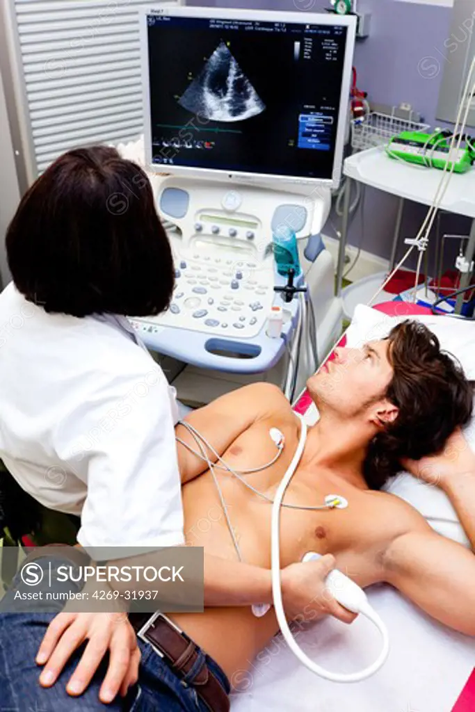 Patient undergoing a heart ultrasound scan. Limoges hospital, France.