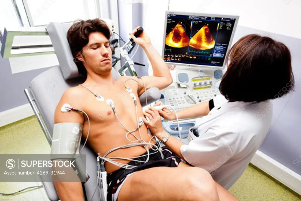 Man undergoing stress echocardiography, a heart ultrasound performed during stress. Limoges hospital, France.