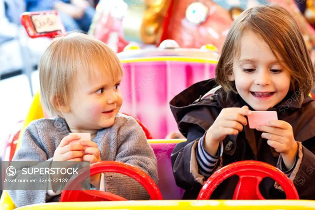 Children on a merry-go-round.